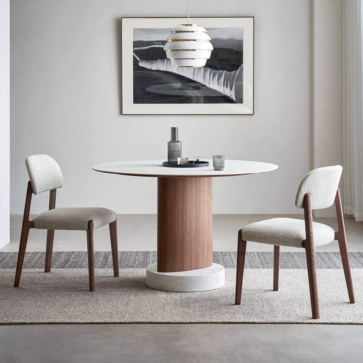 Aalto Round Sintered Stone Dining Table with walnut pedestal and marble base
