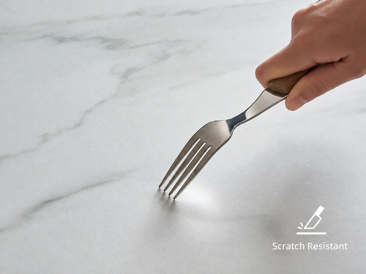 Aalto sintered stone dining table top demonstrating scratch resistance
