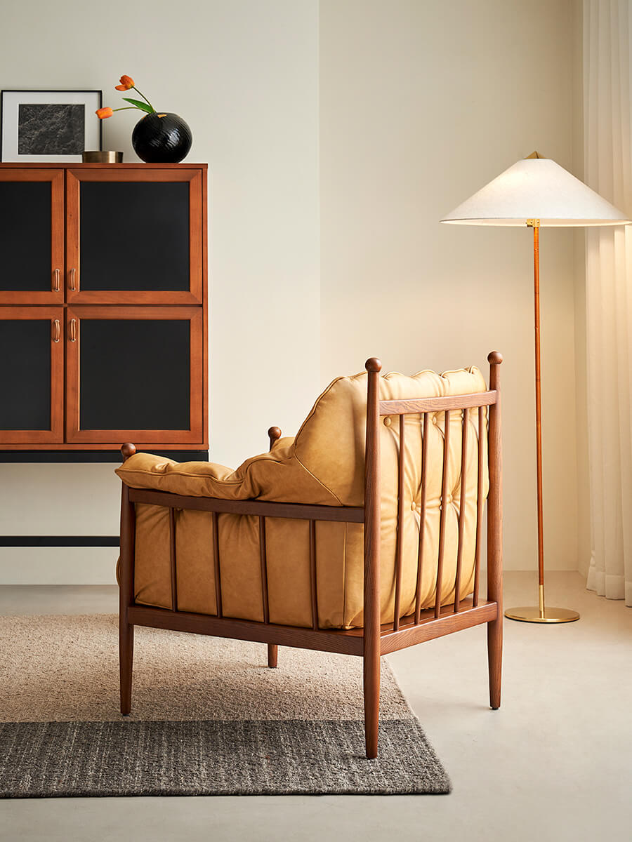 Allan Armchair side profile with exposed timber frame