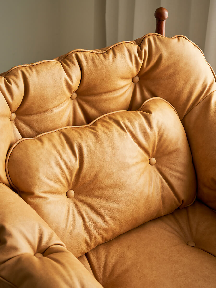Allan Armchair tufted leather cushion detail