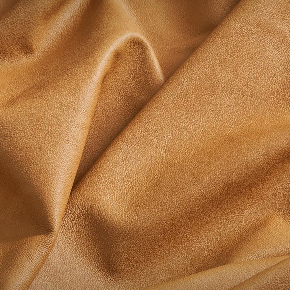 Tan top grain leather sample for Allan Armchair