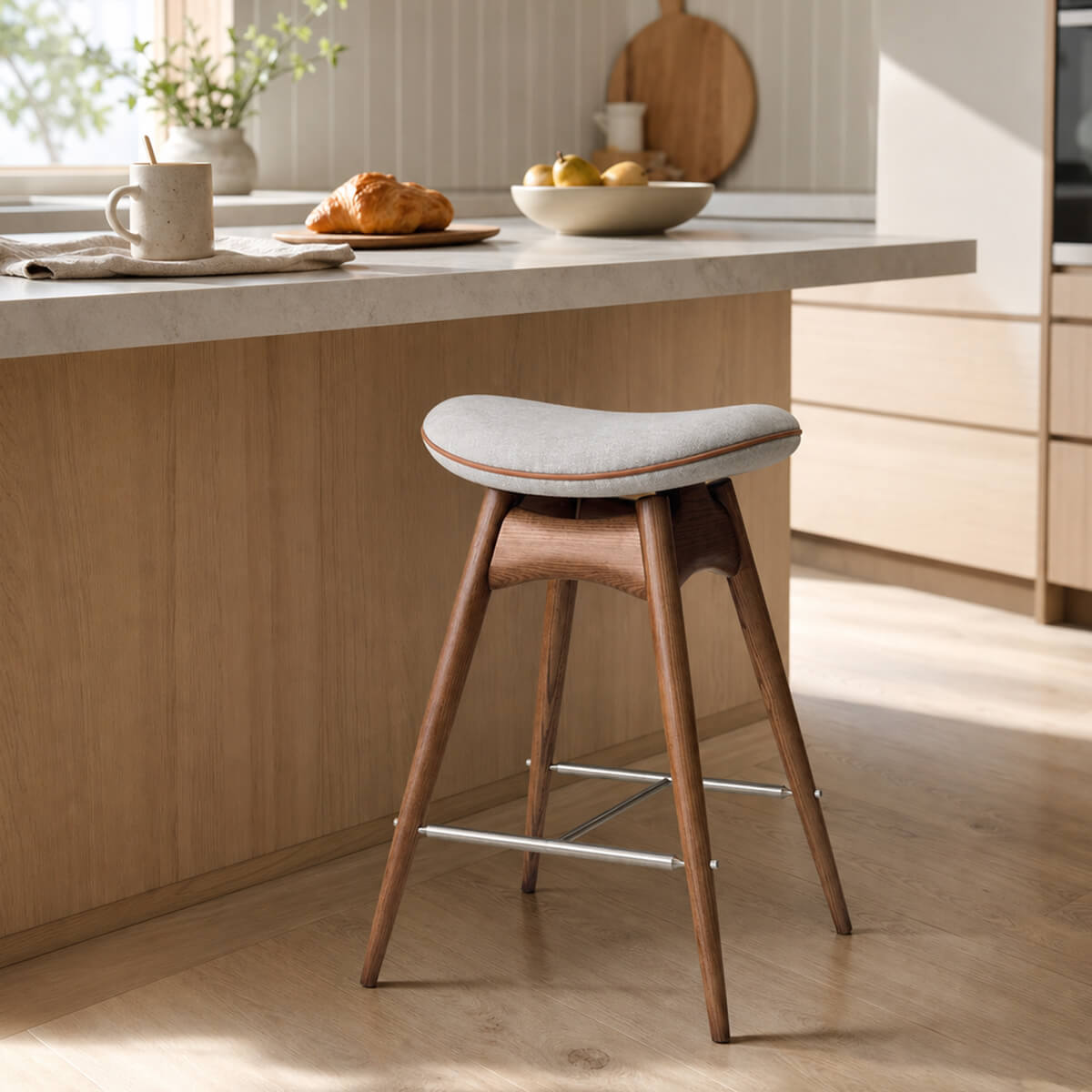 Andy solid American ash bar stool with upholstered saddle-shaped seat