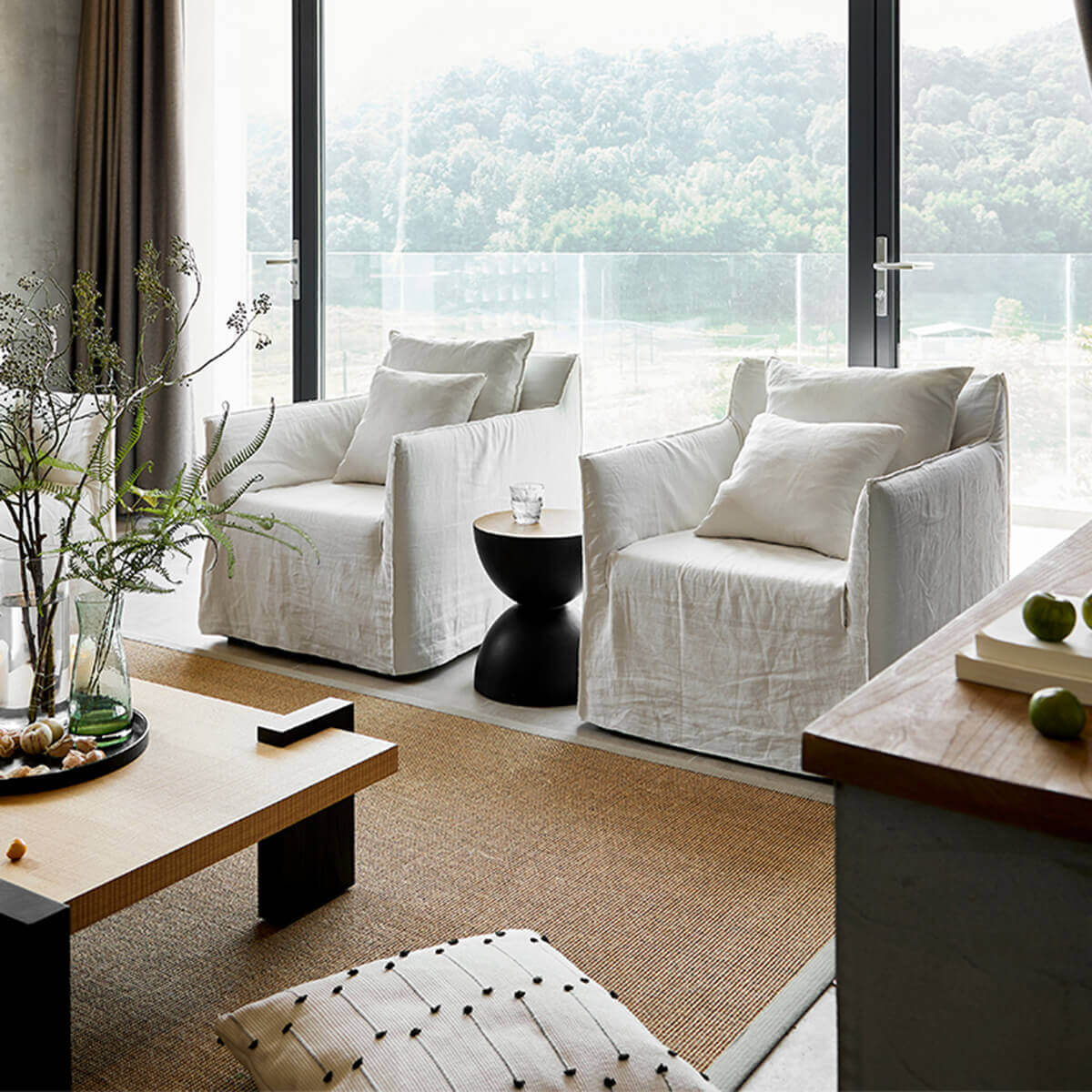 Pair of Anya armchairs in a contemporary living room
