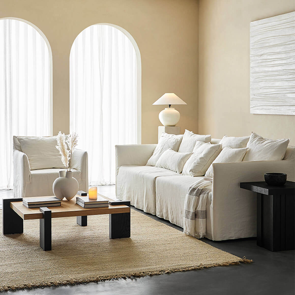 Anya armchair and matching sofa in modern living room
