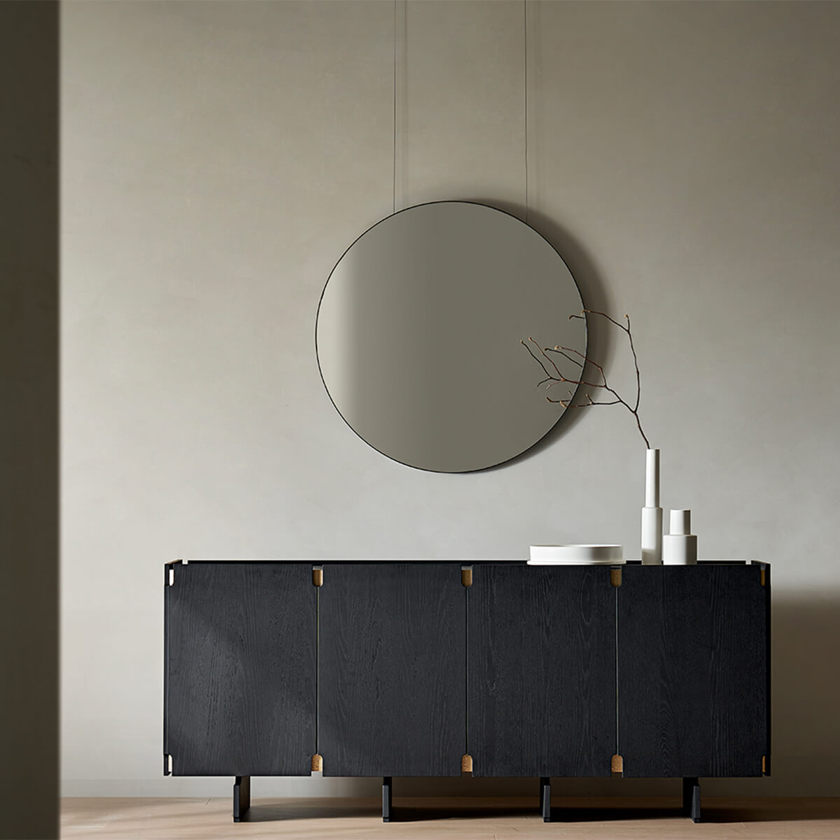 Arden black sideboard with brass accents in a contemporary interior
