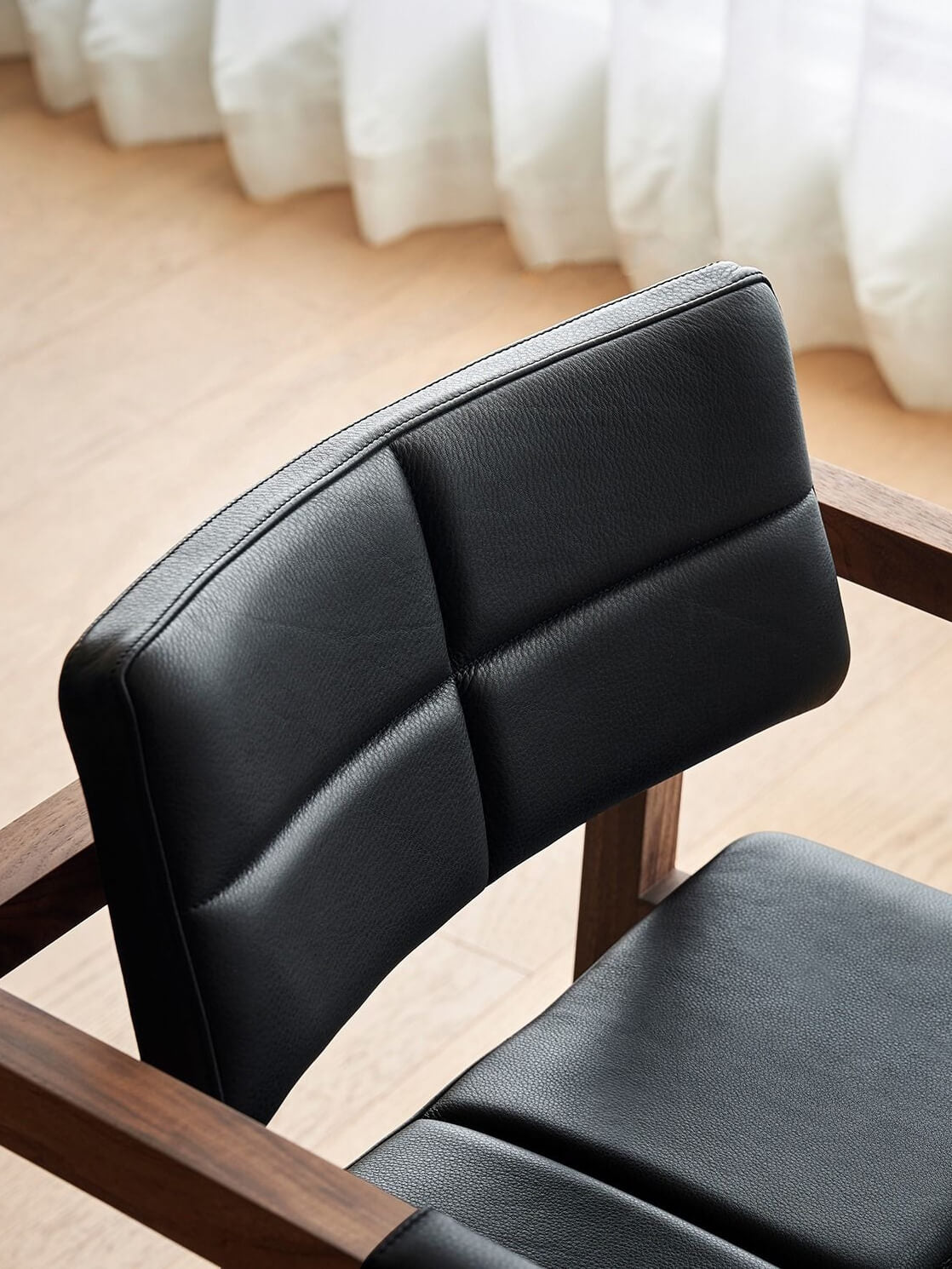 Close-up texture of full grain leather on Arden dining chair