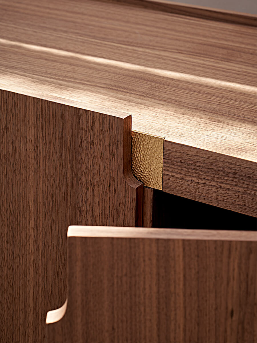 Arden sideboard door detail with integrated brass accent