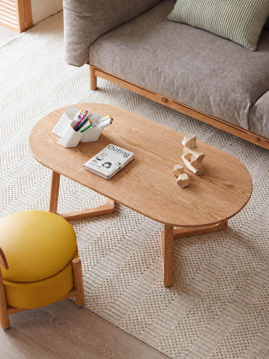 Aspen Solid Oak Coffee Table in a family living room with children's activities