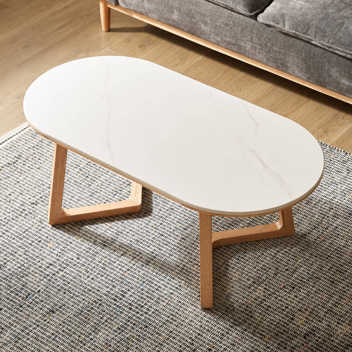 White sintered stone tabletop detail of the Aspen Solid Oak Coffee Table