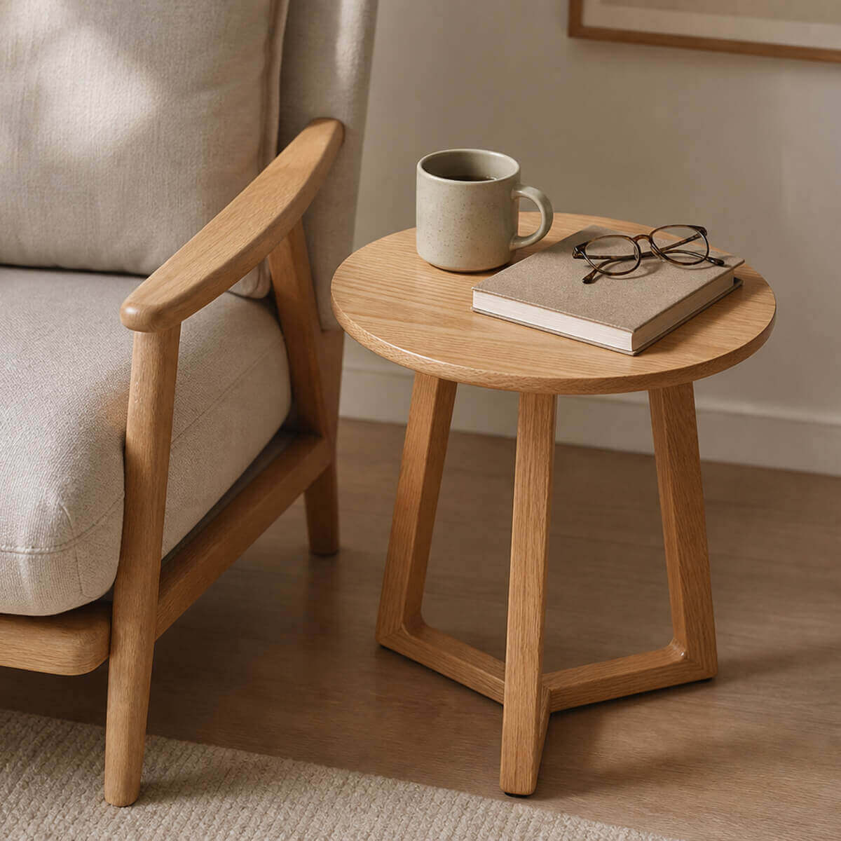 Aspen Solid Oak Side Table beside a lounge chair in a contemporary reading corner