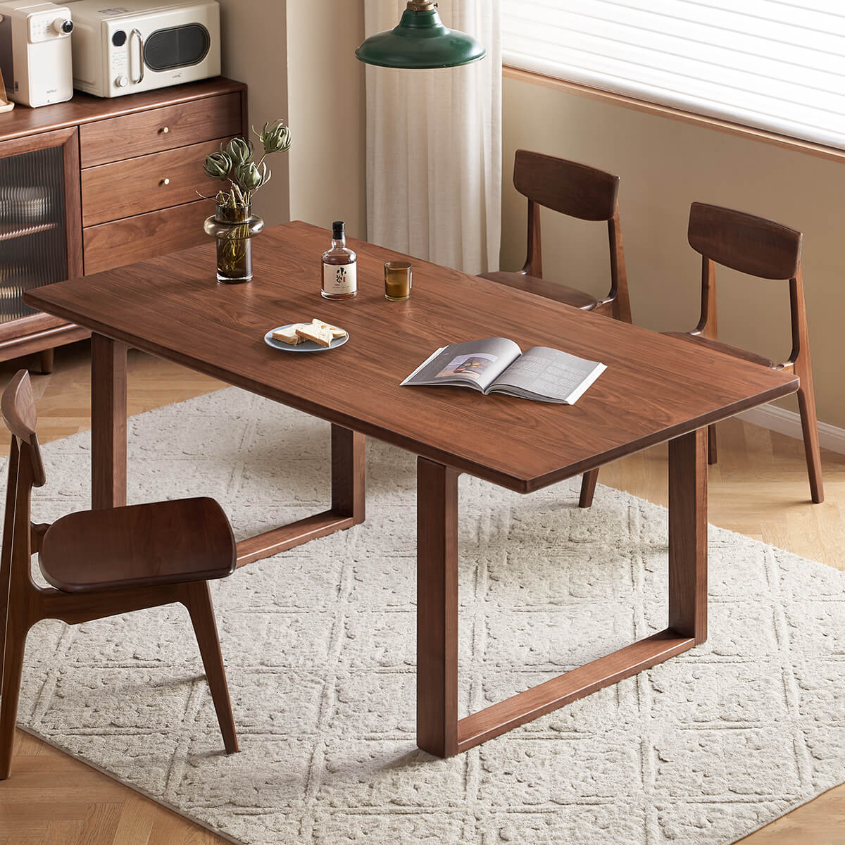Aster solid walnut dining table in modern dining room