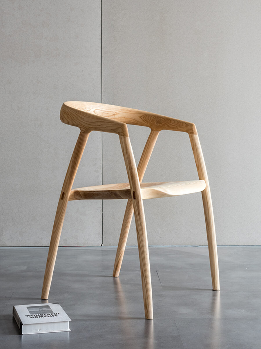 Side profile of Bata timber dining chair