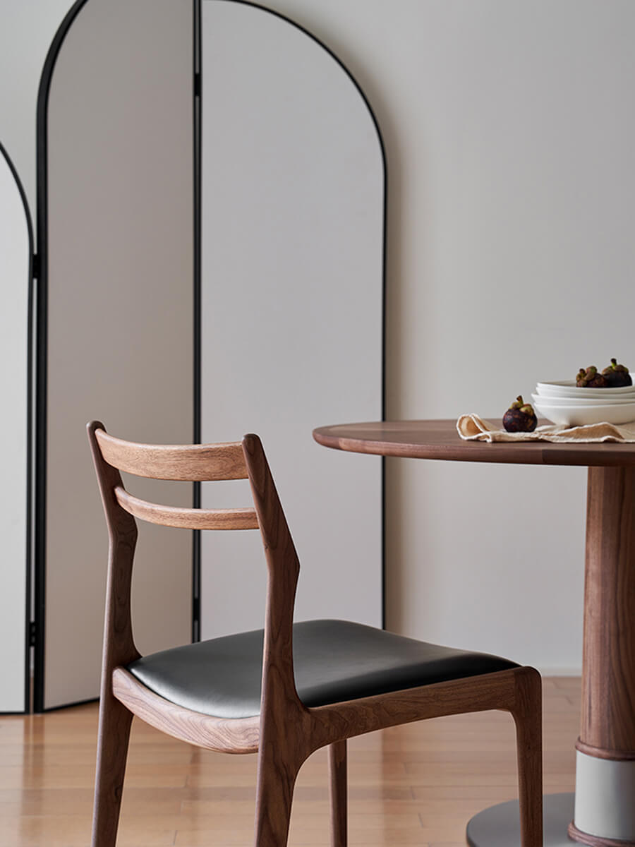 Beck walnut dining chair in contemporary home interior