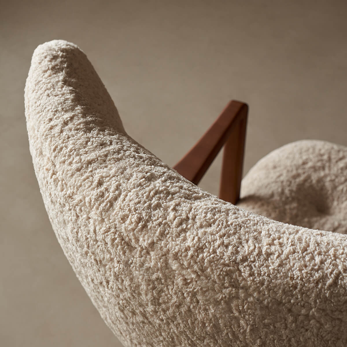 Close-up of bouclé upholstery texture on the Berkeley Armchair
