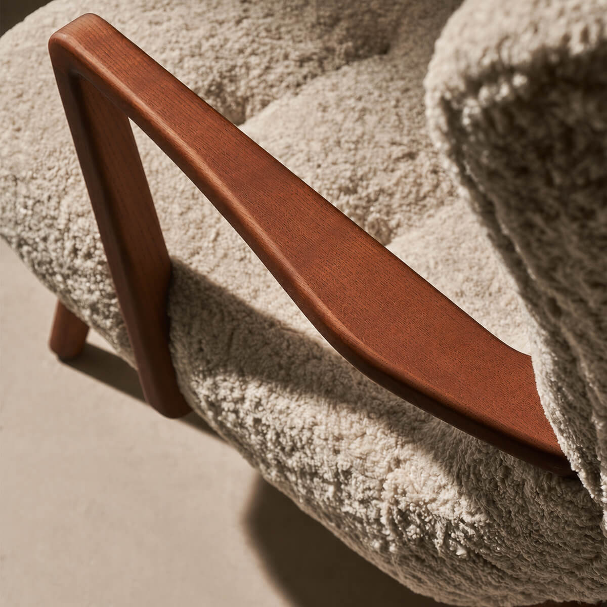 Solid ash timber armrest craftsmanship on the Berkeley Armchair