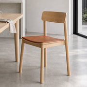Betty dining chair in a Scandinavian dining room with natural light