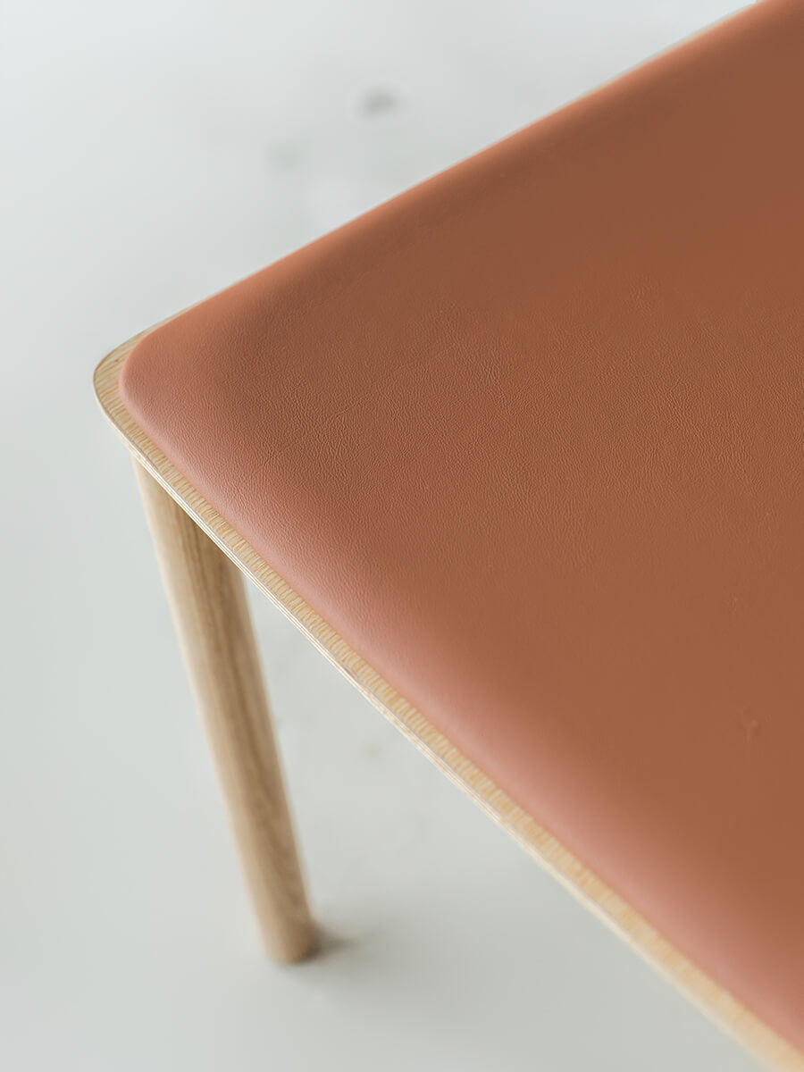 Close-up of Betty dining chair leather seat detail