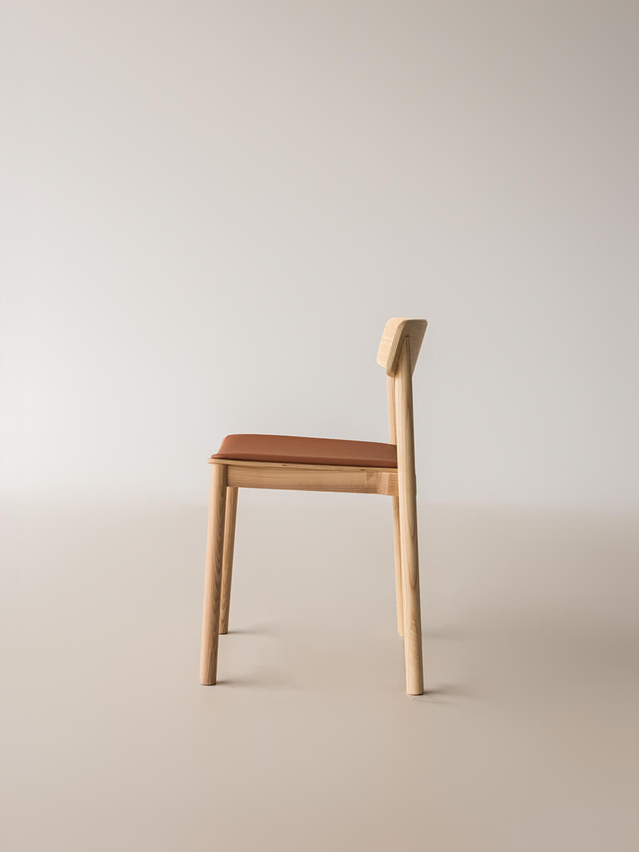 Side profile of Betty dining chair