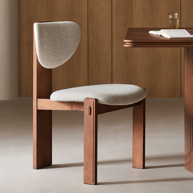 Bianca contemporary upholstered dining chair with sculptural timber frame