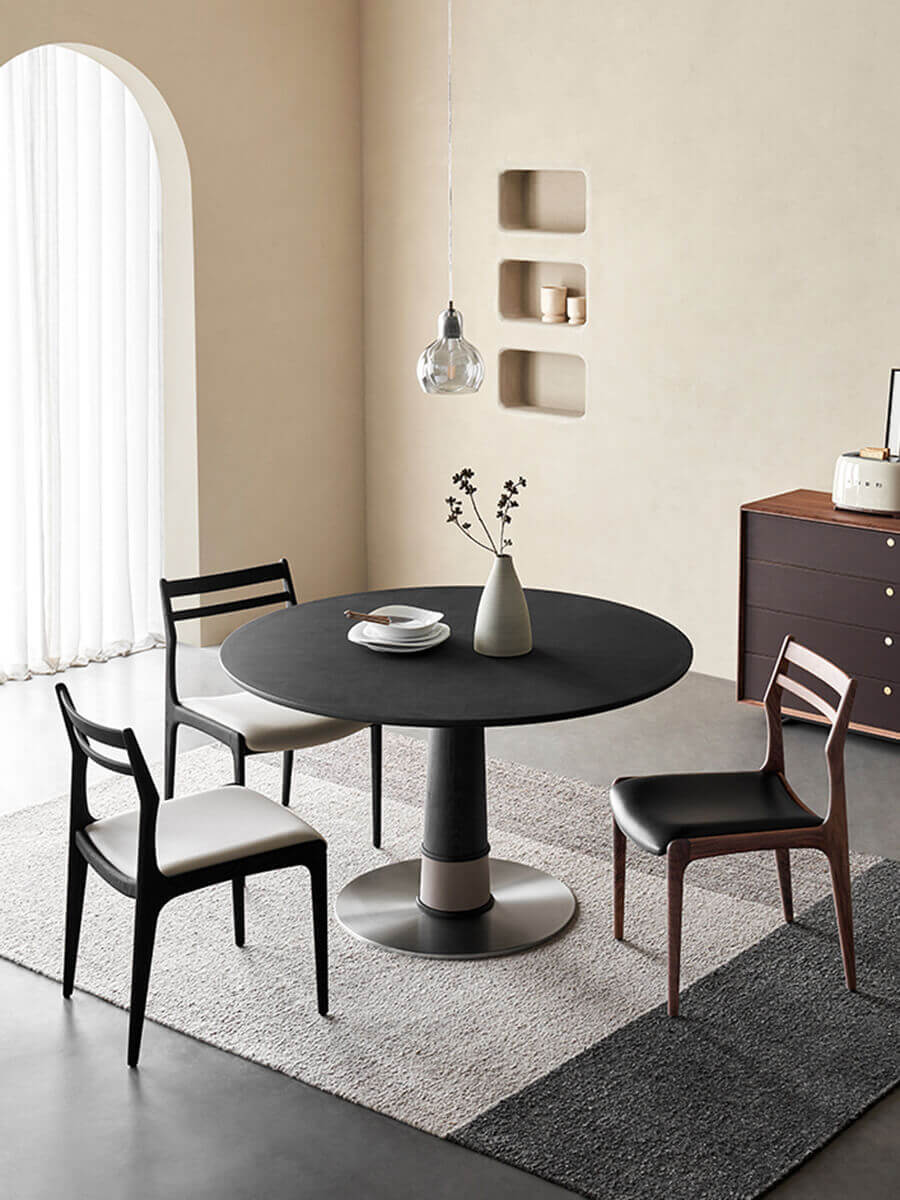 Cambell round dining table black finish in a modern dining room