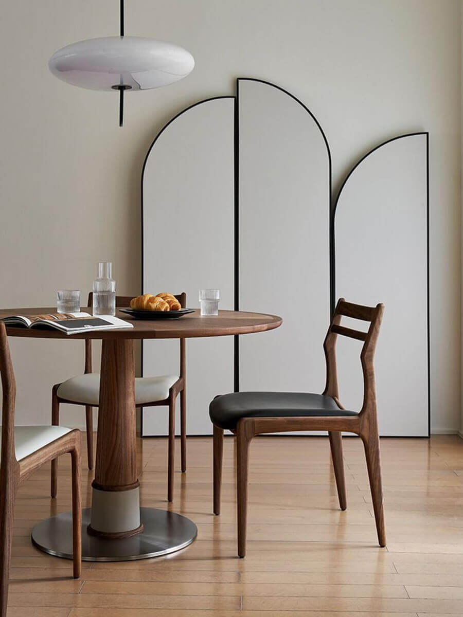 Cambell round dining table in a contemporary dining space