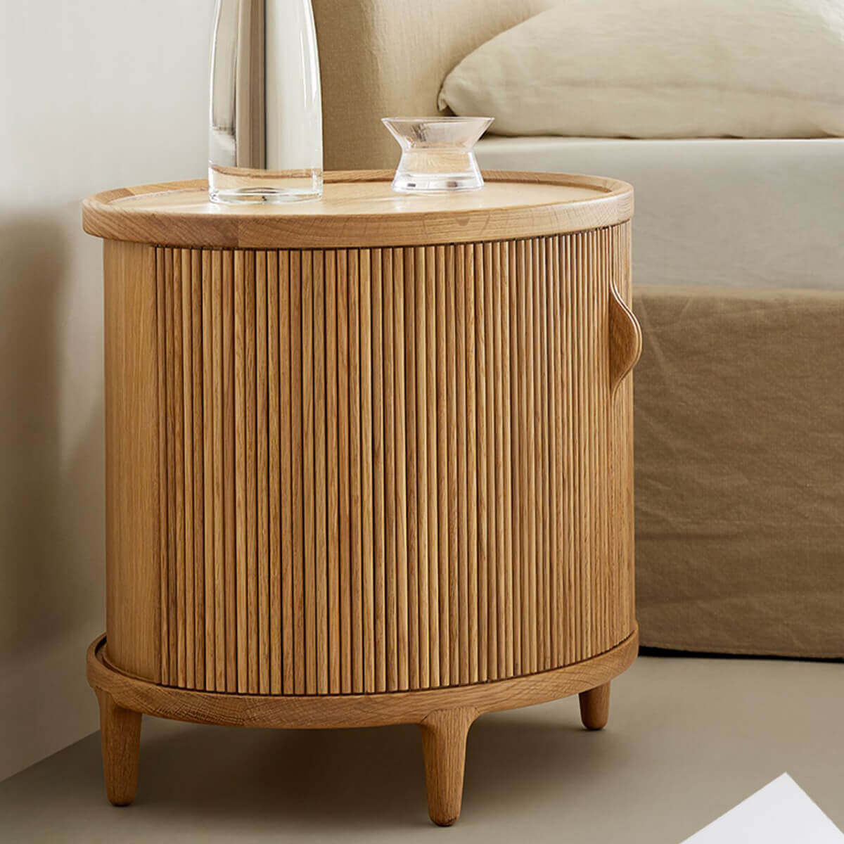 Oak Charlie Tambour Bedside Table in a contemporary bedroom
