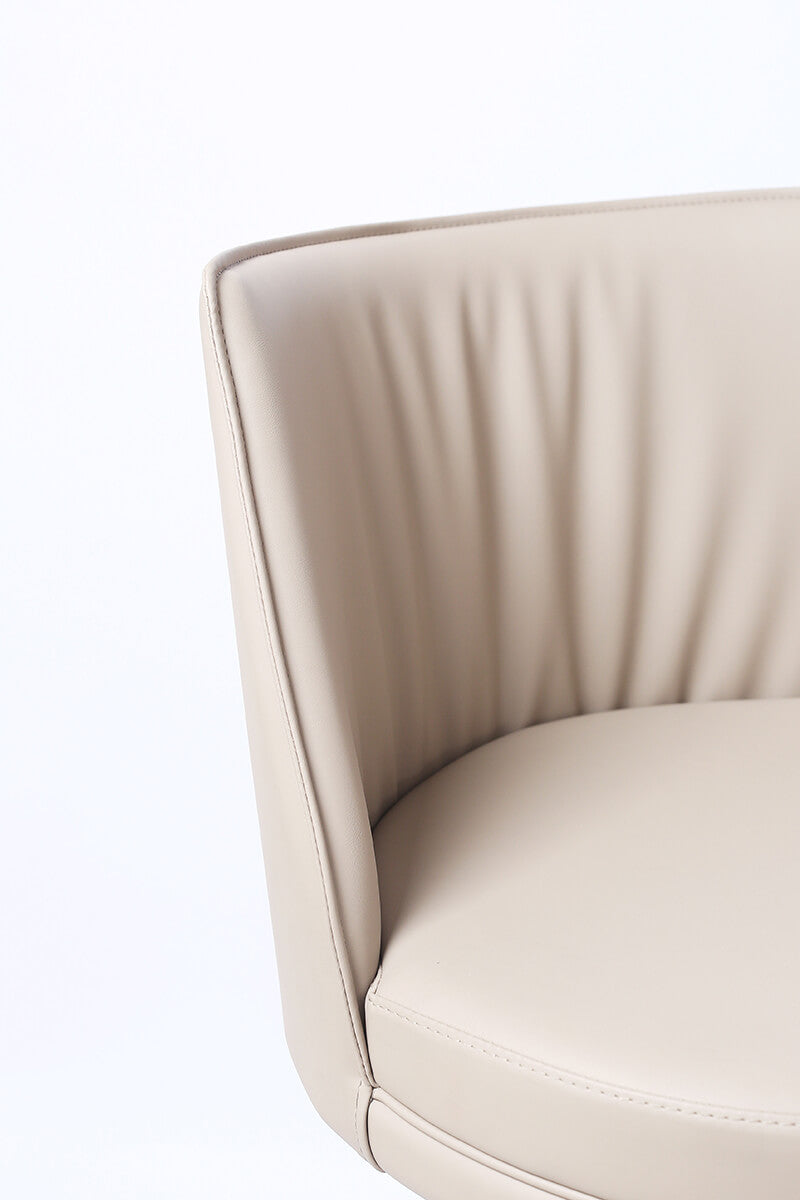 Close-up of Clayton Bar Stool upholstery and stitching details