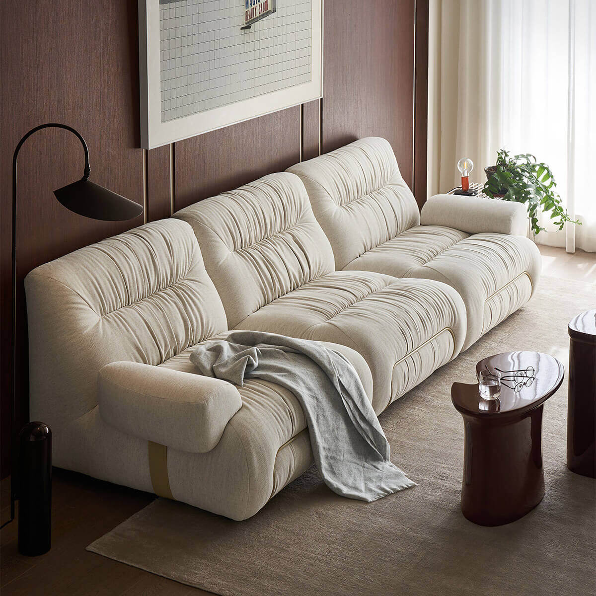 Cloudscape Armchair and matching sofa in cream fabric upholstery