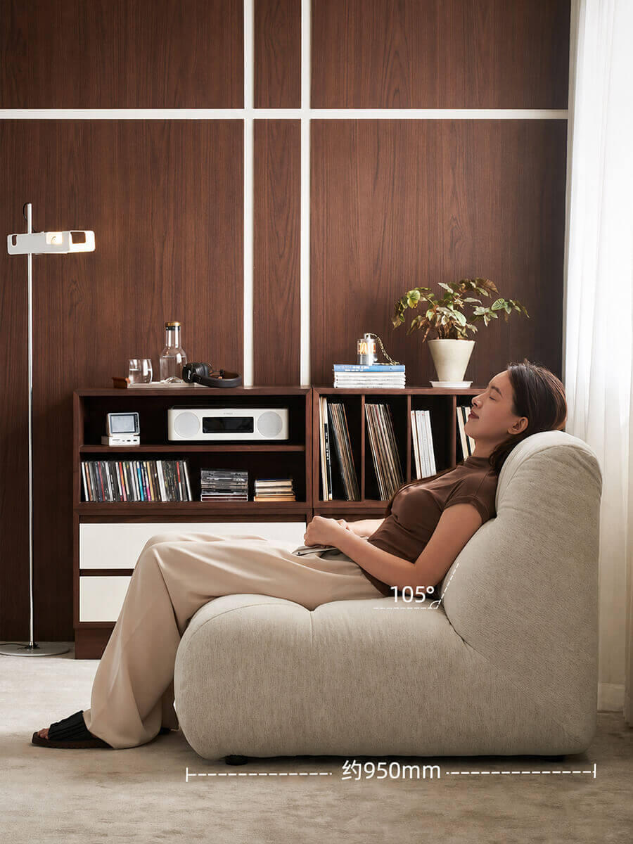 Side profile of the Cloudscape Armchair showing a 105-degree reclining angle and deep seat design