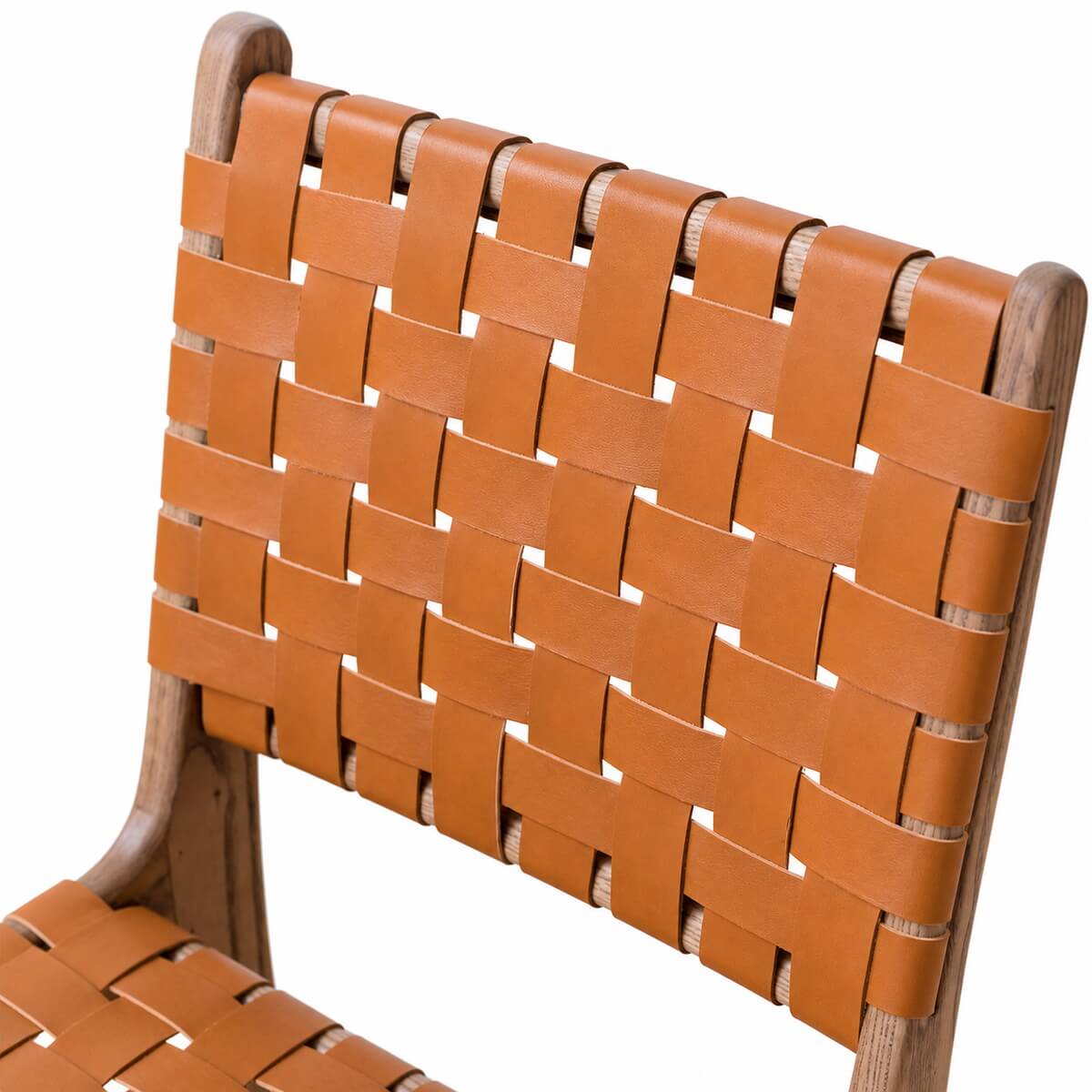 Close-up of Connar dining chair woven saddle leather backrest detail