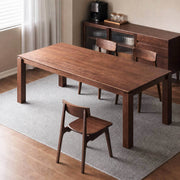Dalton Solid Walnut Dining Table in a modern dining room setting
