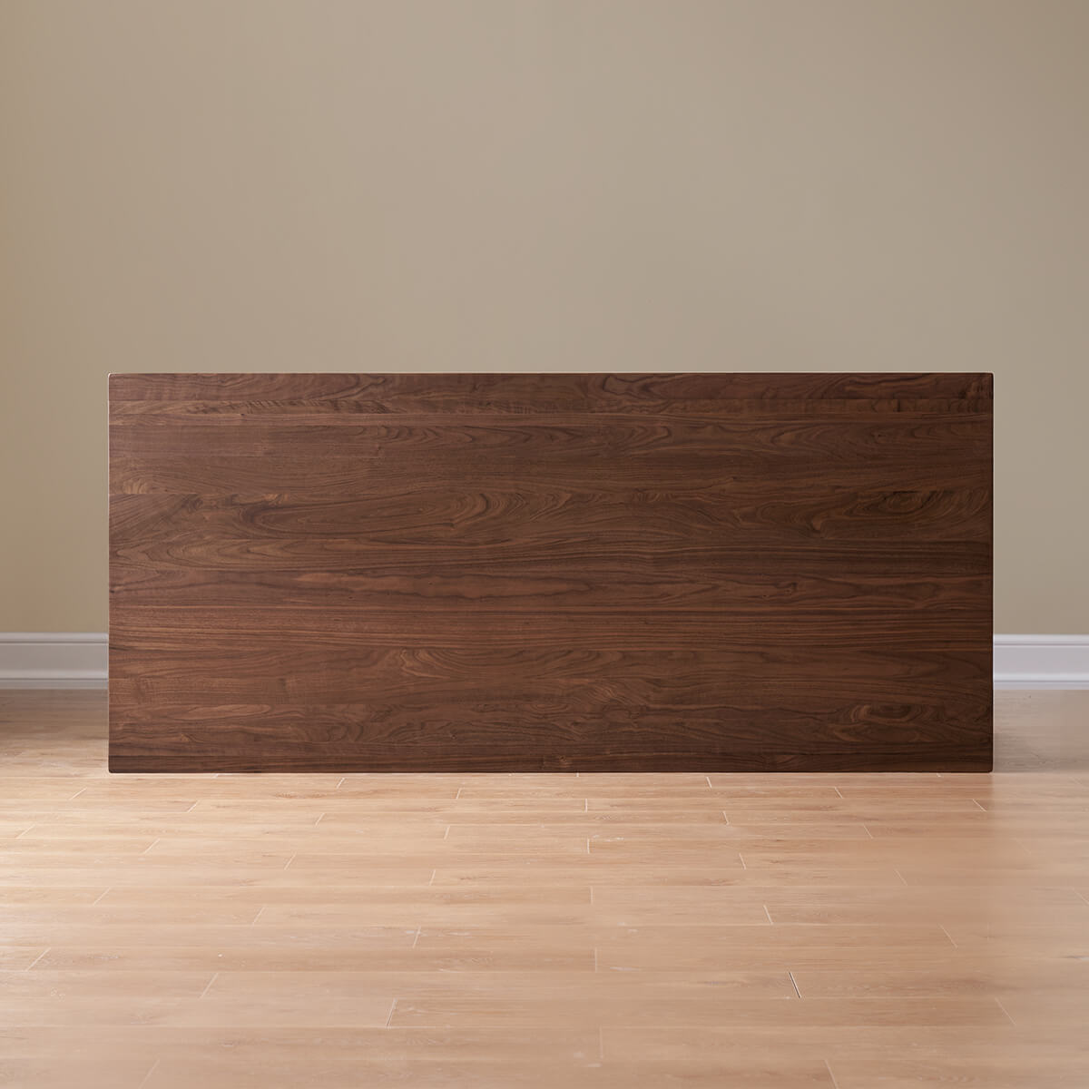 Solid walnut tabletop showing natural timber grain detail