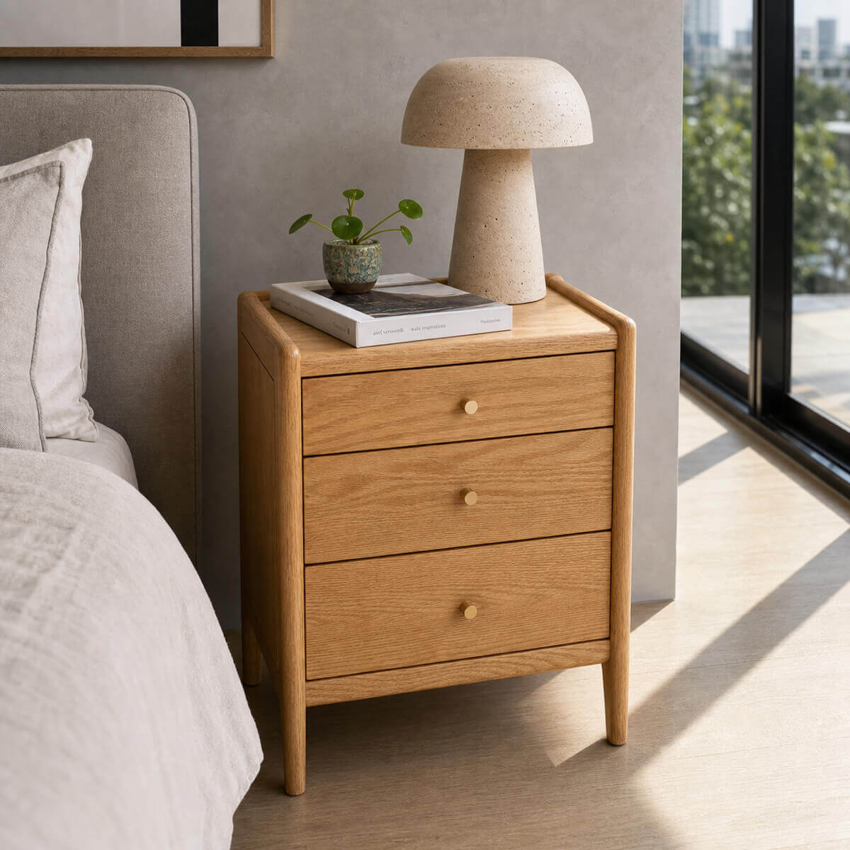 Denmark Solid Oak Bedside Table in a modern bedroom with natural light