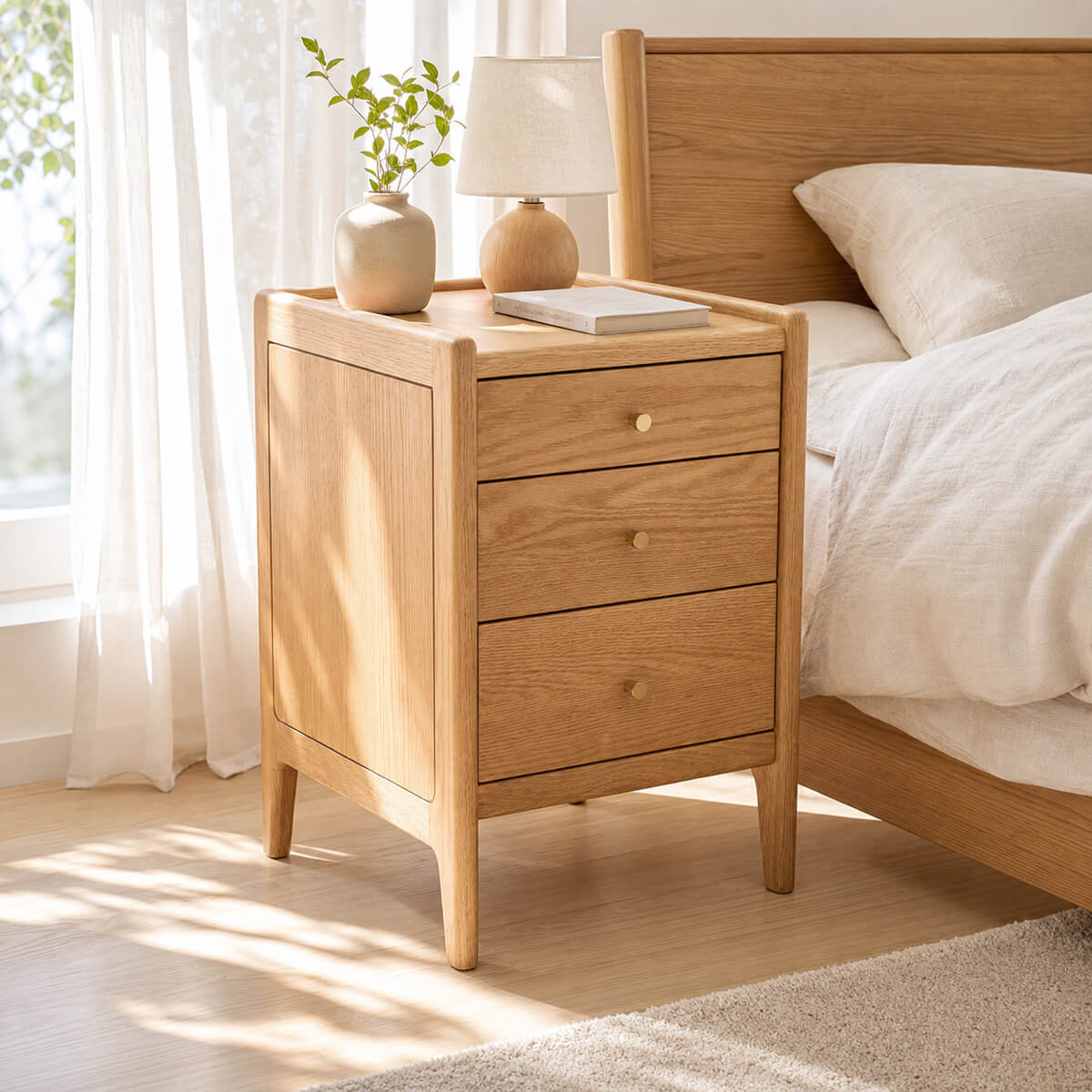 Denmark Solid Oak Bedside Table styled in a Scandinavian bedroom