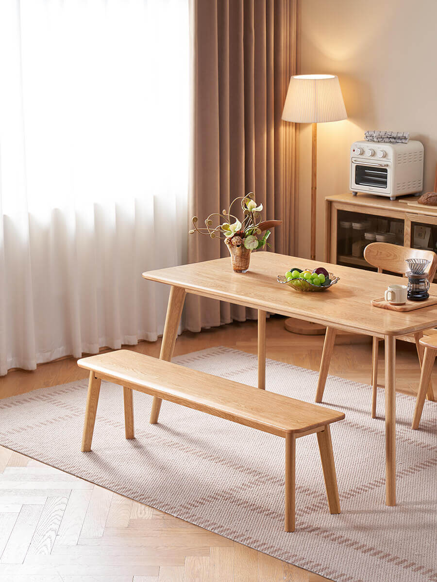 Denmark solid oak dining bench in a bright dining room