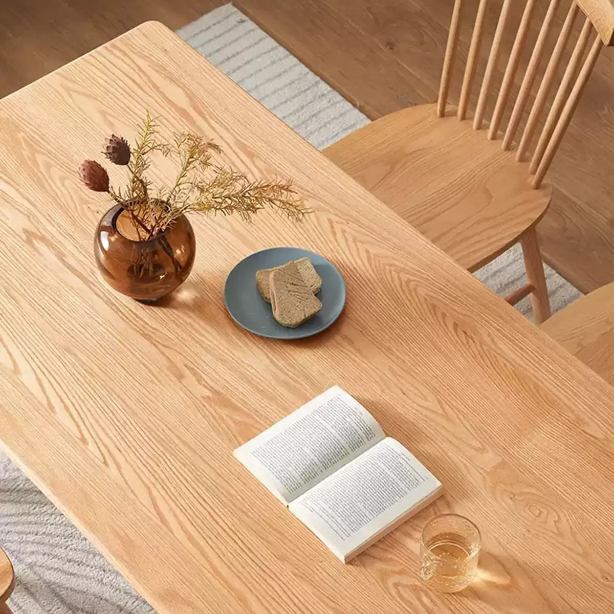 Close-up of the Denmark Solid Oak Dining Table showcasing natural oak grain details