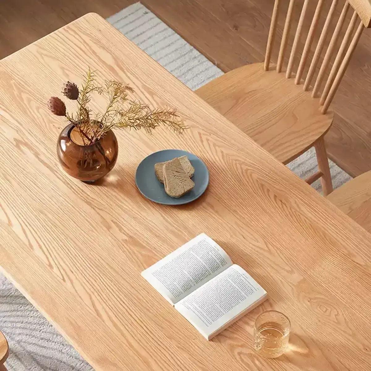 Close-up of the Denmark Solid Oak Dining Table showcasing natural oak grain details