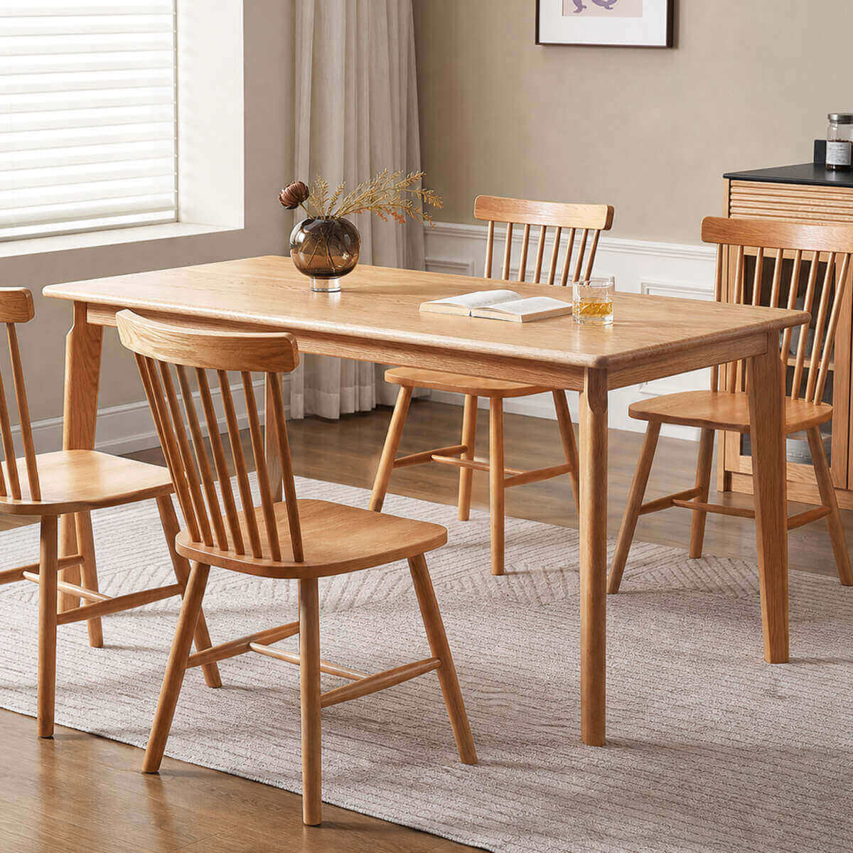 Denmark solid oak dining table in natural oak finish styled in a Scandinavian dining room