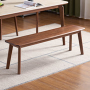 Denmark solid walnut bench in a dining room setting