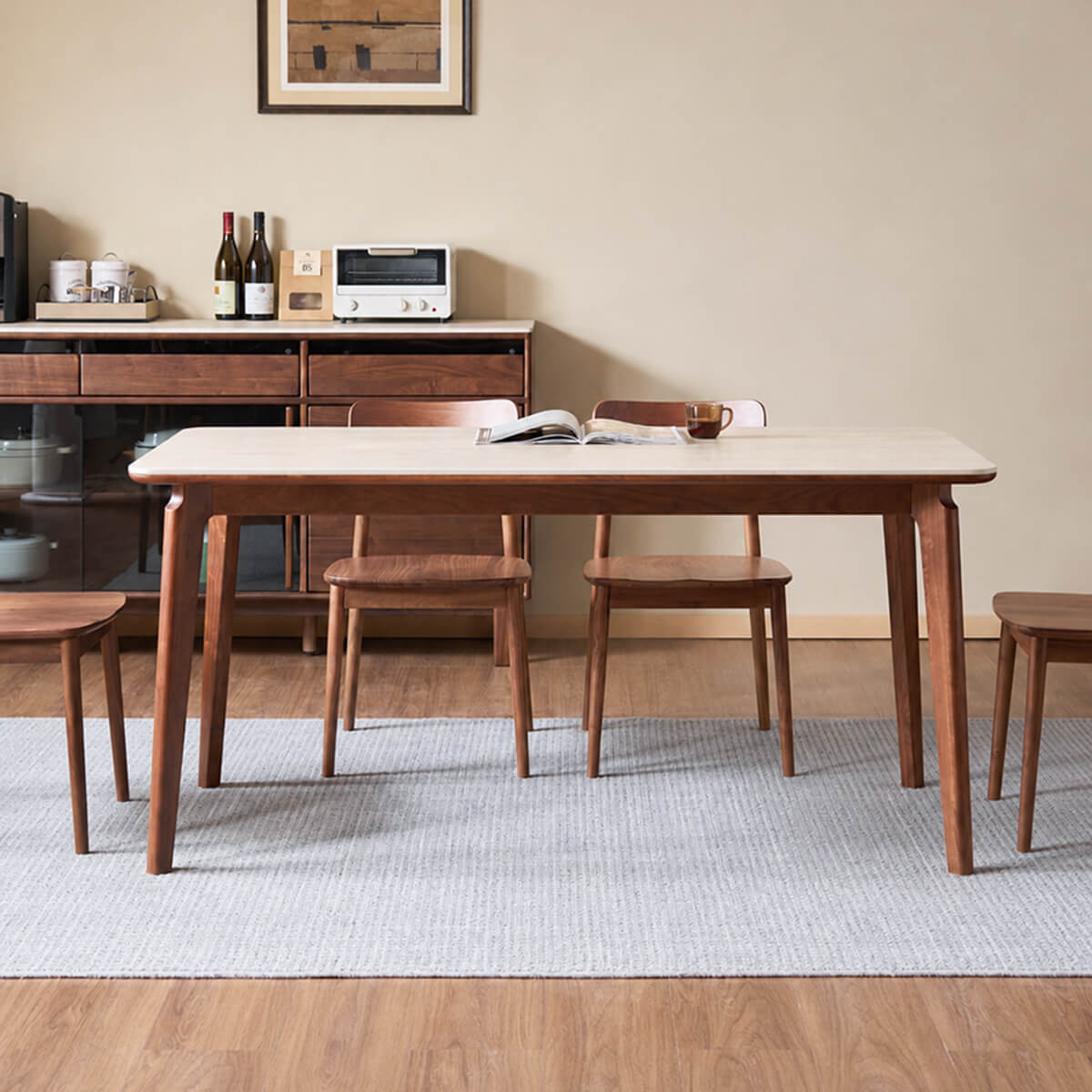 Denmark Solid Walnut Dining Table with sintered stone top shown from the front