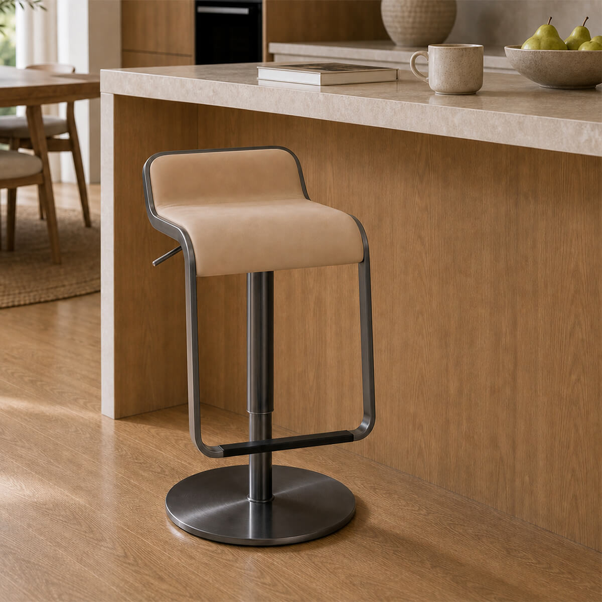 Dion Gas Lift Swivel Bar Stool beside a modern kitchen island