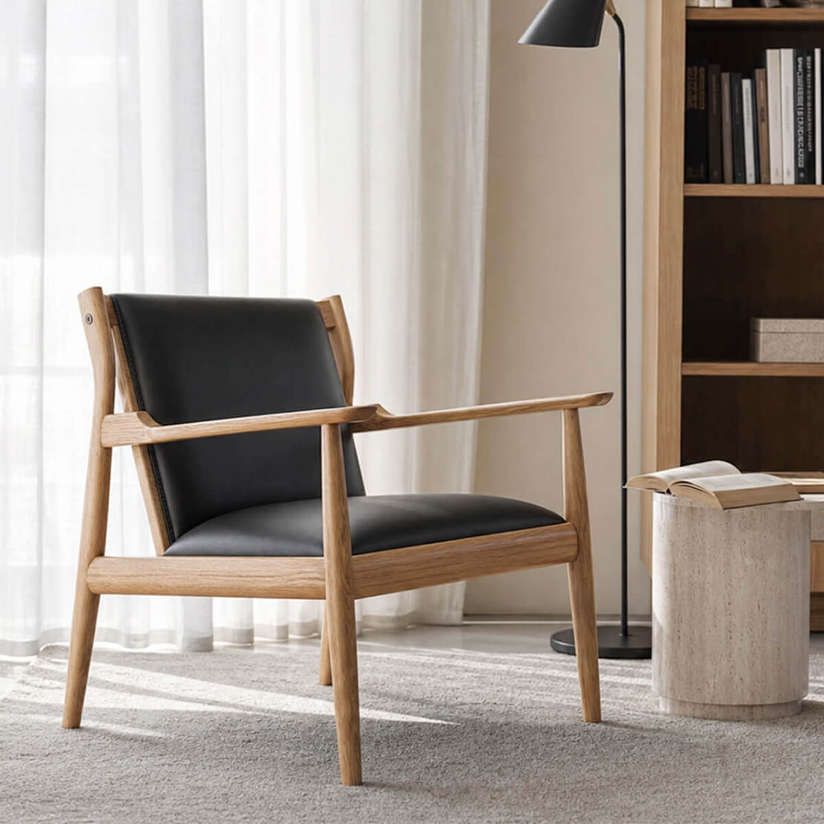 Douk solid American ash armchair with black leather upholstery