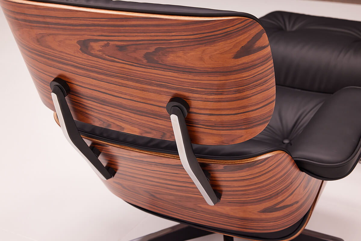 Walnut veneer shell detail of Eames lounge chair replica