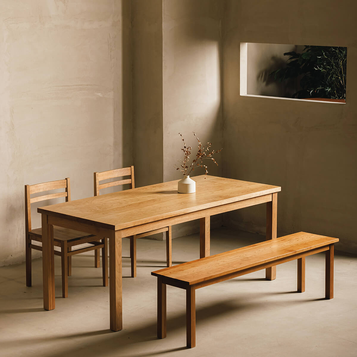 Edge Solid Cherry Classic Dining Table with matching bench in a contemporary dining room