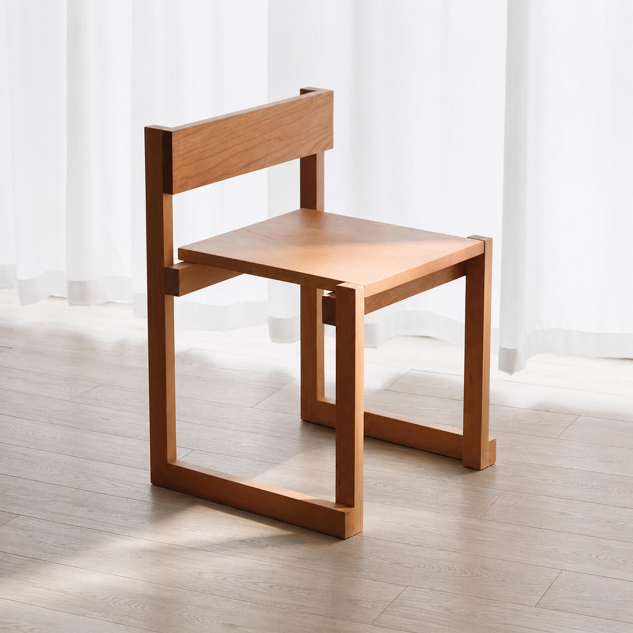 Edge Solid Cherry Dining Chair in a bright modern dining room