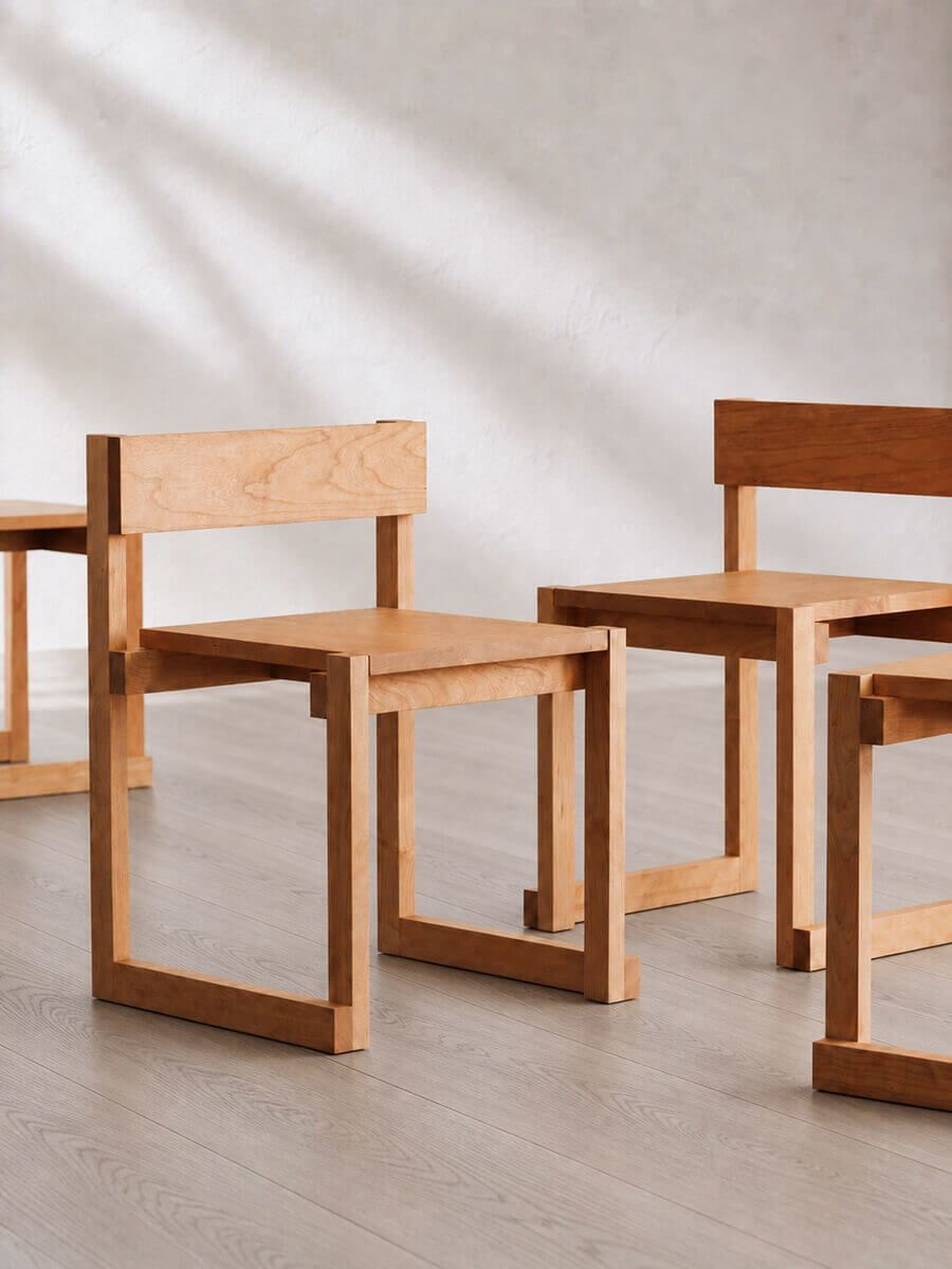 Set of Edge Solid Cherry Dining Chairs in a contemporary dining space