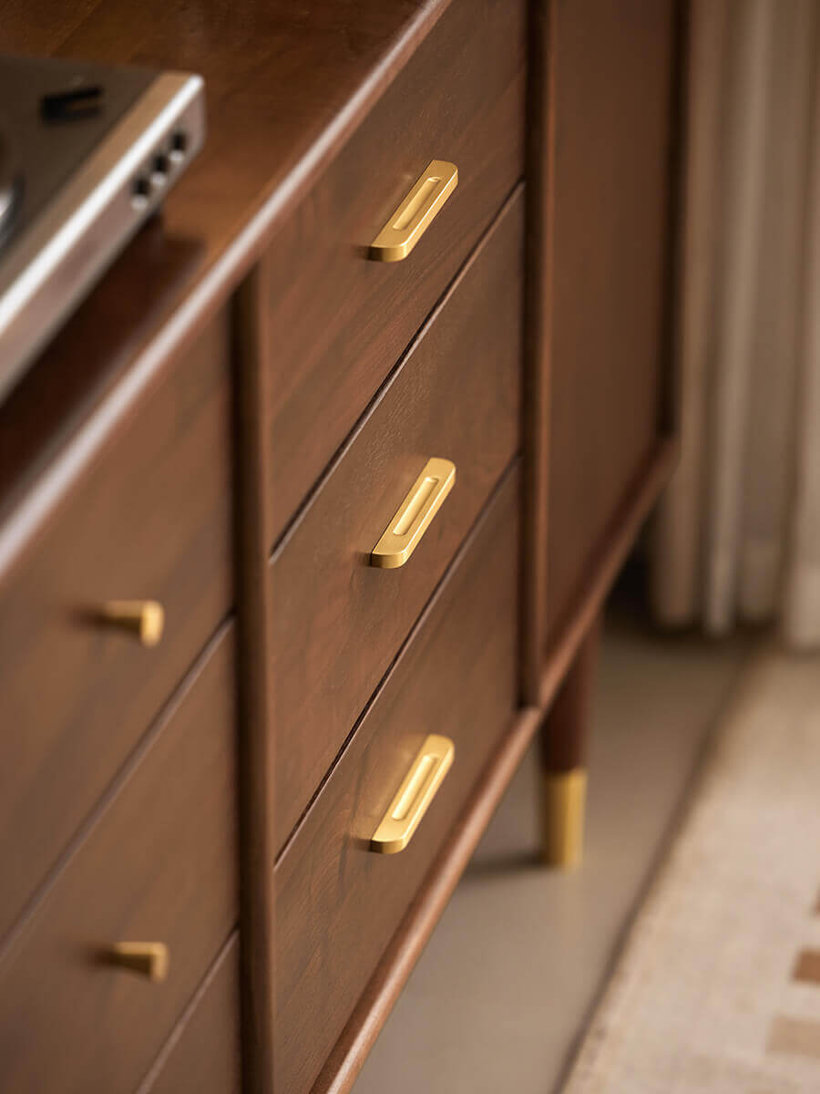 Brass handle detail on the Elara Solid Walnut Sideboard