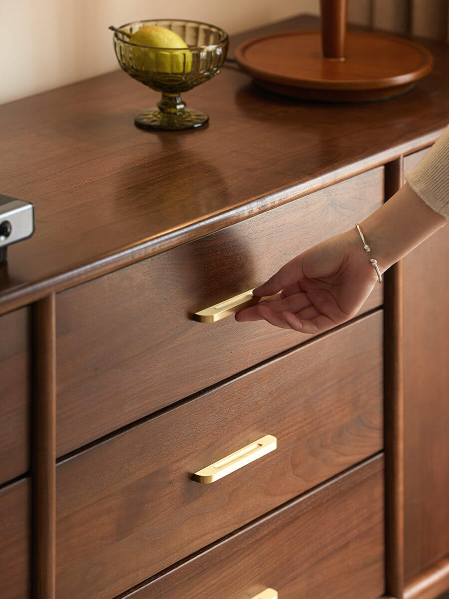 Brass handle detail on the Elara Solid Walnut Sideboard