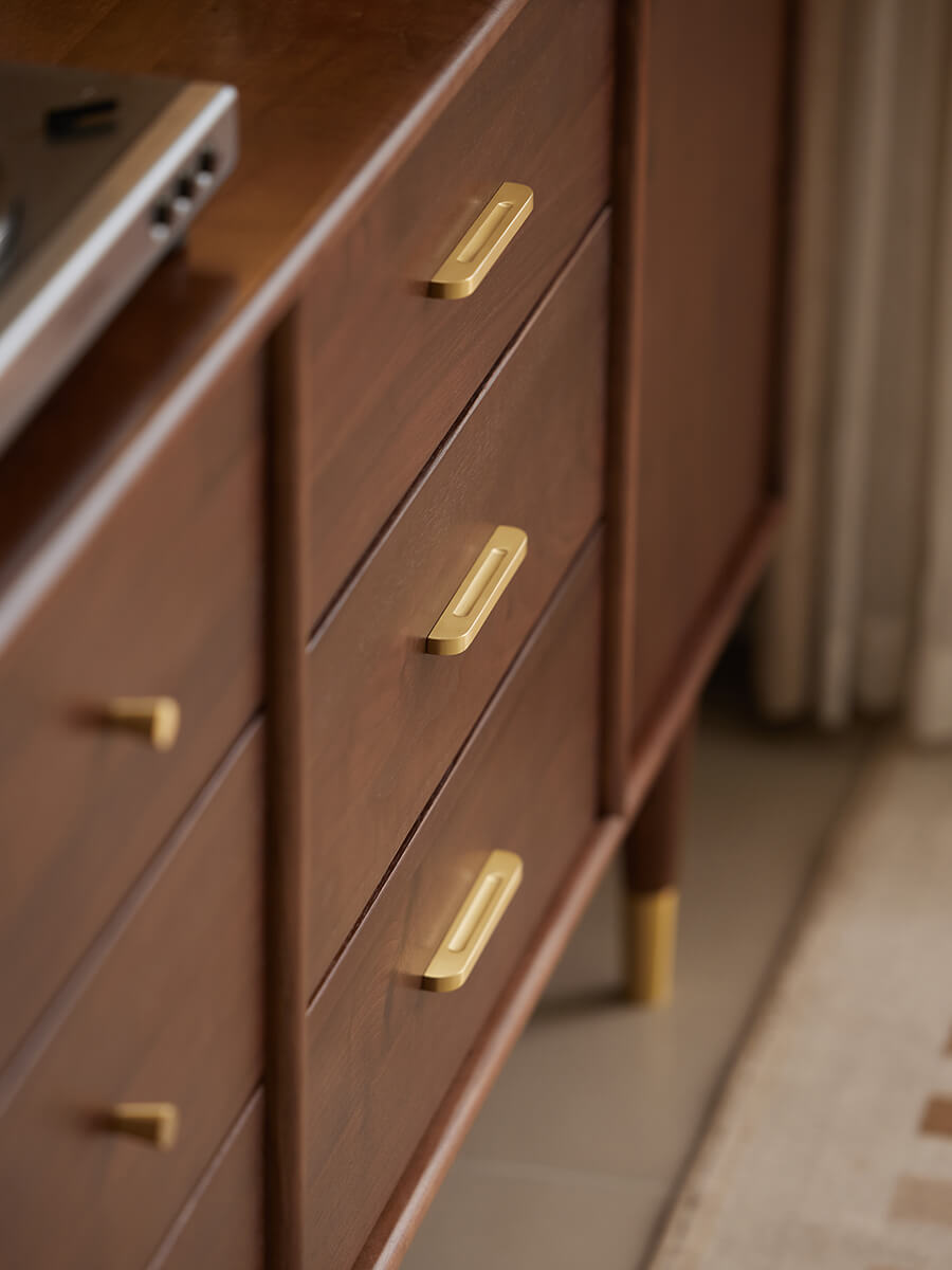 Brass handle detail on the Elara Solid Walnut Sideboard