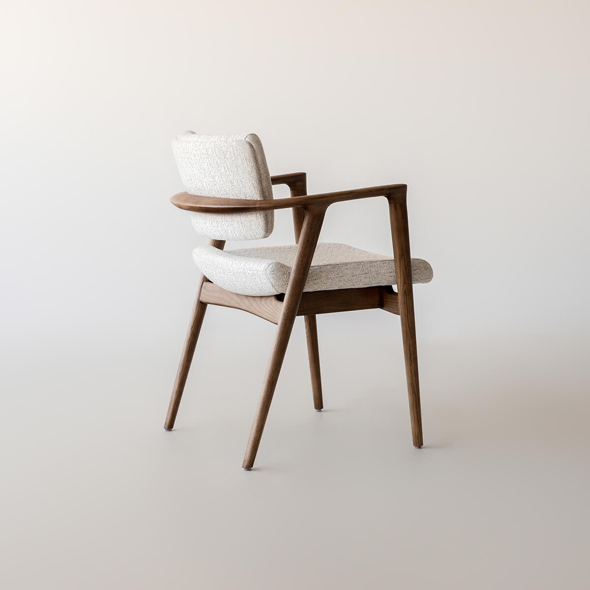 Rear view of Emerson dining chair with upholstered backrest and solid timber frame